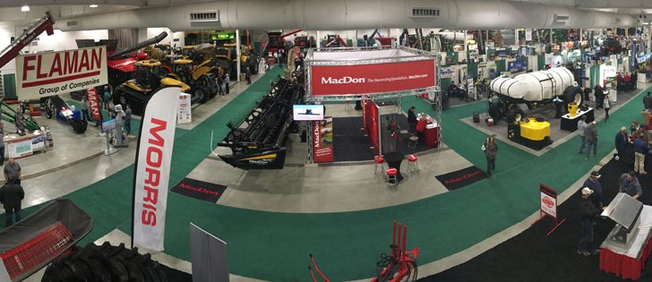 Opening day at Crop Production Show in Saskatoon drew a crowd inside despite poor weather conditions outdoors. | Mike Raine photo
