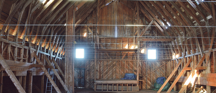 Shingling and repairs are underway on the Fluet barn, built in 1933 near Mosside, Alta.  |  Les Dunford photo