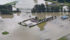 A house was surrounded by water after the Fraser River burst its banks in Chilliwack, B.C. in June 2012. A new study warns that more flooding in the agriculturally important region is likely because of climate change. | REUTERS/Andy Clark photo