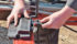 Installing the Legend SA is easy, according to Kris Kennedy. The sensors are connected in a daisy chain manner, meaning that each sensor simply plugs into the neighbouring sensor, all the way along the entire width of the drill. Where the the two daisy chains meet in the middle, they plug into the Legend SA module transmitter shown here. | Ron Lyseng photo