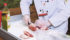 Duane Ellard of Canada Beef, top, shows how to cut and prepare a Triple A Canadian striploin steak at the SIAL food trade show in Toronto in May. | Karen Morrison photo