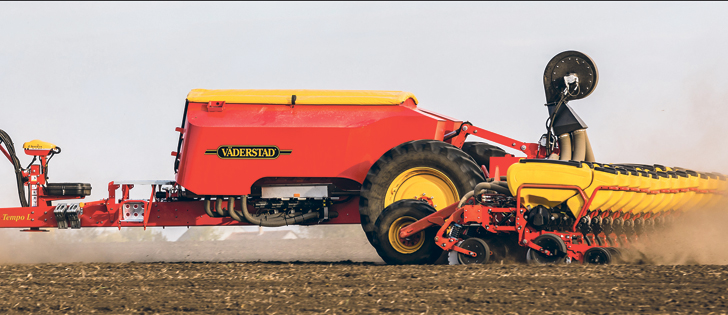 Seed and pesticide are delivered through the system of conventional hoppers.  Fertilizer from the front air tank goes down through separate openers.  All this at more than 13 m.p.h.  | Vaderstad photo