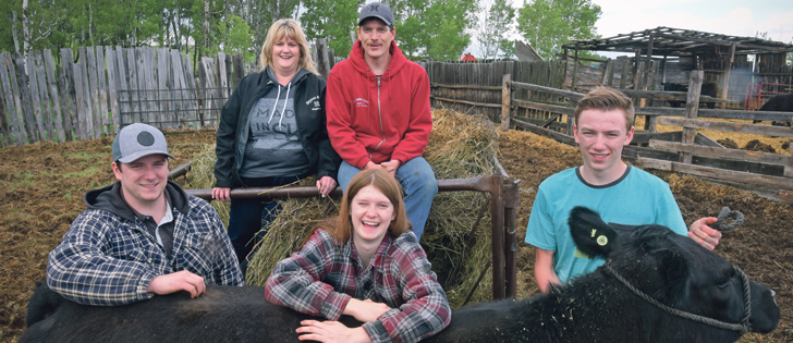 Lisa and Mark Haynes farm with their children, Dylan, left, Kolby and Keaton. With their parents working off the farm, the children play an active role in their cattle operation. | William DeKay photo