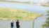 Alberta Soils Tour participants view Syncrude’s East Lake reclamation project north of Fort McMurray, Alta. One of the company’s ongoing operations is visible in the background. The lake is a former mine that was 60 metres deep. | Barb Glen photo