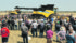 There were harvest demonstrations of fall rye crop at Ag In Motion this year. Here, farmers gather around a New Holland CR9 90 combine to monitor its performance at the show site near Langham, Sask. | Robin Booker photo