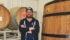 Kirk Zembal, one of the owners of Blindman Brewery at Lacombe, Alta., poses beside newly imported oak casks used to age wine. The company imported them from France to mature their craft beer. | Barbara Duckworth photo