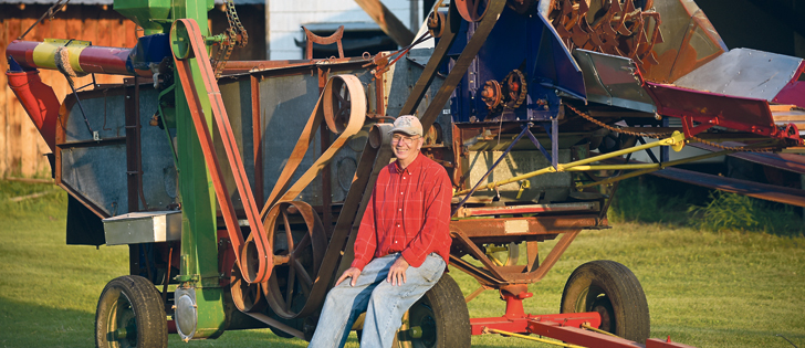Ken Mack of Langenburg, Sask., says his most recent restored grain thresher is a keepsake. He painted the borrowed parts from various other machines different colours so people would know which ones are not original.  |  William DeKay photo