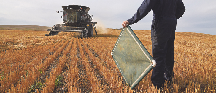 Checking for combine losses is a key part of any growing season. Once the amount of loss is known it can be balanced against all the other factors that go into a growing season.  |  File photo