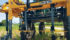 The Reichhardt Tactile Row Guidance system uses yellow paddles to sense when the applicator or combine is straying into the corn row. | Jayme Paquin photo
