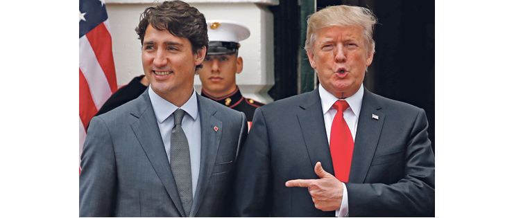U.S. President Donald Trump welcomed Prime Minister Justin Trudeau on the south lawn of the White House before their meeting about the NAFTA trade agreement renegotiation in Washington, D.C. on Oct. 11.  |  REUTERS/Jonathan Ernst photo