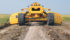 The same machine can crown a road or crown a back slope when the wings are back past the centre line, or contour a ditch when the wings are forward. With the wings raised, the full force of the machine is concentrated on the six-foot wide blade at the centre of the machine for work in hard ground. | Bridgeview Manufacturing photo