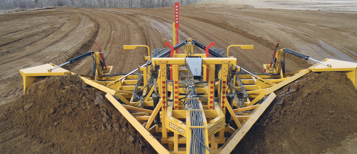 The V-Wing 3200 HD and 2100 HD use multiple arms, wings and hydraulic cylinders to delicately move precise volumes of soil in creating wide shallow ditches that won’t wreck farm equipment. | Chris Laing photo 