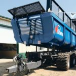 The Canadian-built Penta DB60 carries 1,950 cubic feet or 33 tons of silage, grain or manure. To ensure the box remains snug on the trailer chassis, the DB carts have two large mounting knuckles at each corner. The trailers have an extra stability cylinder on each side of the main dump cylinder so the box won’t lean left or right. The new DB60 and DB70 carts have ElectroSteer on the front and rear axles. | Robin Booker photo