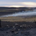 The cause of an Oct. 17 wildfire that began near Hilda, Alta., and spread into Saskatchewan is likely to determine what assistance is available to farmers and ranchers who sustained losses. | File photo