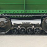 The new Unverferth Equalizer tow tracks feature an automated grease system that gives the bearings a quick shot of grease once per hour whenever the cart is moving. | Robin Booker photo
