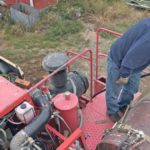 Ray Labrecque tops up the used vegetable oil slip tank he mounted on his combine. He converted his 20-year-old Massey 20 years ago and says he hasn’t had any problems.
| William DeKay photo