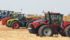 At the Ag In Motion show site near Langham, Sask., high-powered tractors are lined up for the daily field demonstrations. The 2017 show had tillage, combines and the DOT Technologies autonomous field tool. | Michael Raine photo
