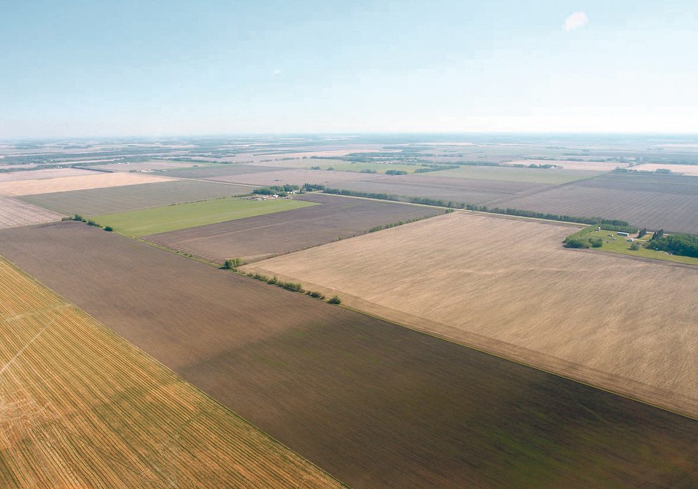 Lower commodity prices and tighter margins are expected to take their toll on farmland prices in the United States.  |  File photo