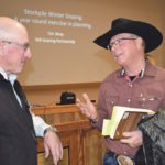 Jim Bauer, right, of Anchor JB Ranch near Acme, Alta., discusses grazing issues with rancher Andy Hart of Claresholm, Alta., during a forage and grazing workshop. | Barb Glen photo