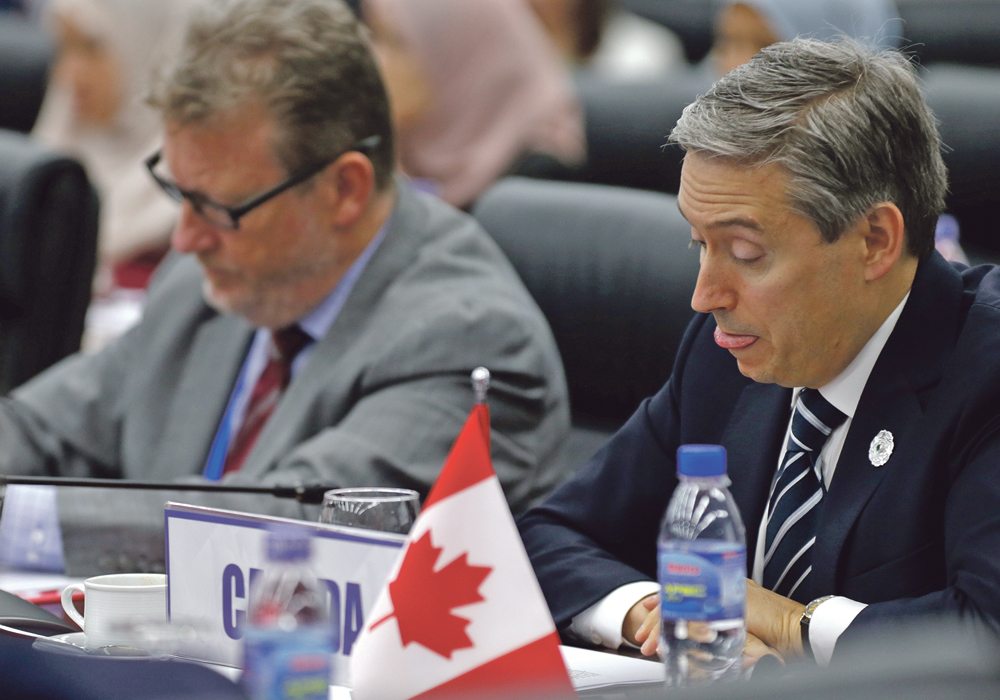 International Trade Minister François-Philippe Champagne, right, attended the Trans Pacific Partnership ministerial meeting in Da Nang, Vietnam, last fall, where Canada was accused by some of jeopardizing the talks. The government is now being urged to do what it takes to get a deal signed before it’s too late.  |  REUTERS/Na Son Nguyen photo