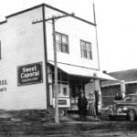 Alf and Thelma Foster stand in front of their store sometime in the 1940s. They bought the store in 1939 and eventually added a Cockshutt farm equipment agency. They renovated the second floor living quarters and lived there during their time in Benalto. The Fosters sold the store in the mid 1940s. |
Jim Foster photo