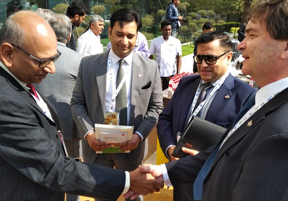  
Alberta Agriculture and Forestry Minister Oneil Carlier (right) meets with representatives from the India Pulse and Grain Association and Alberta’s New Delhi Office at the 2018 Pulse Conclave in New Delhi. | Alberta government supplied photo