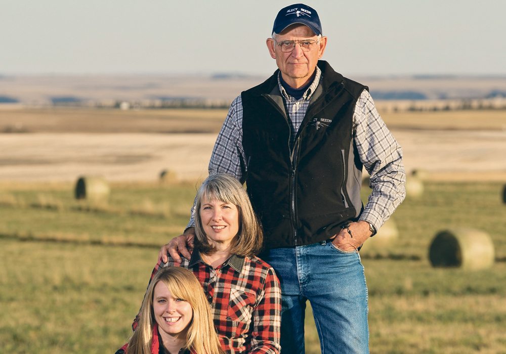 Sarah Hoffmann and her parents, Karen and Garry Weigum, are using a plan that will transition the farm to Hoffmann in the future.  |  Photo supplied by Sarah Hoffmann