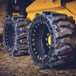 Downtime due to tire failure is rare with the Evolution tire. If a segment is damaged, the two 3/4 inch nuts are removed while the tires are in place. The segment lifts out and a replacement drops in. The new nuts are tightened up and the machine is ready to go again. | Derek Hird photo