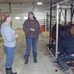 Sandi Gray, right, who farms in the Rural Municipality of Perdue in Saskatchewan and is a member of the third shift, talks to her daughter, Kylah, while working with livestock. | Valerie Elliot photo