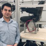 University of Saskatchewan researcher Behzad Bashiri stands beside a tractor simulator at the Canadian Centre for Health and Safety in Agriculture. Bashiri constructed the simulator to monitor physical and mental stresses on farm machinery operators. | Brian Cross photo