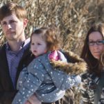 Edouard Maurice and his family leave Provincial Court in Okotoks, Alta., March 9 after he appeared on charges of aggravated assault, pointing a weapon and careless use of a firearm Feb. 24 following an alleged robbery at his rural home. The provincial government announced measures last week that it hopes will combat rural crime in the province. | Mike Sturk photo