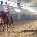 Cain Quam practices cowboy mounted shooting in his arena near Kendal, Sask. | William DeKay photo