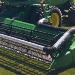 The Airbar system allows faster ground speeds by improving feeding into the header. The airflow also reduces shatter losses. | Carmen Drost photo