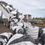 Saskatchewan’s new province-wide grain bag recycling program grew out of a six-year pilot program run by SimplyAg Solutions. This photo was taken during a collection day that SimplyAg Solutions held at the landfill in Unity, Sask., in 2014. | File photo