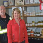 ABOVE: Dave and Krista McBain harvested their first commercial-scale garlic crop in 1996. Since then, they have expanded their business to become one of the largest garlic producers in the province.
BELOW: M & M Garlic at White Fox, Sask., offers 18 products that contain fresh Canadian garlic, including raw garlic, garlic powder, salsas, pickled carrots and pickled beans. | Brian Cross photo