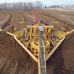 Swan River, Man., farmer/inventor Jeff Penner says his V-Wing allows farmers to build wide, shallow surface drains, which keep the water on the land longer so it can infiltrate the soil. University of Manitoba soil scientist David Lobb says the idea may work sometimes, but snow melt won’t percolate into frozen soil. He says higher organic content and better soil structure are the key elements to improving water infiltration. | Chris Laing photo