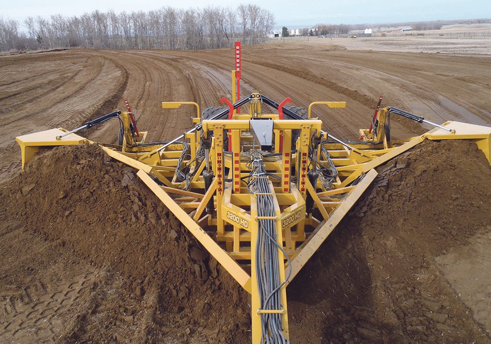 Swan River, Man., farmer/inventor Jeff Penner says his V-Wing allows farmers to build wide, shallow surface drains, which keep the water on the land longer so it can infiltrate the soil. University of Manitoba soil scientist David Lobb says the idea may work sometimes, but snow melt won’t percolate into frozen soil. He says higher organic content and better soil structure are the key elements to improving water infiltration.  |  Chris Laing photo  