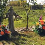 The Eirickson family cemetery is on a slight knoll overlooking a lush green pasture and the gently sloping ravine that runs through it. A statue of St. Francis of Assis watches over the graves of Oli and Irene Eirickson, laid to rest there in 2010 and 2013. | Shirley Byers photo