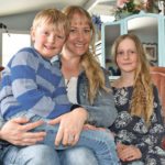 Brady, Jenny and Leena Vandersteen pose on an antique settee often used in Jenny’s photo shoots at the family’s ranch west of Pincher Creek, Alta. | Barb Glen photo