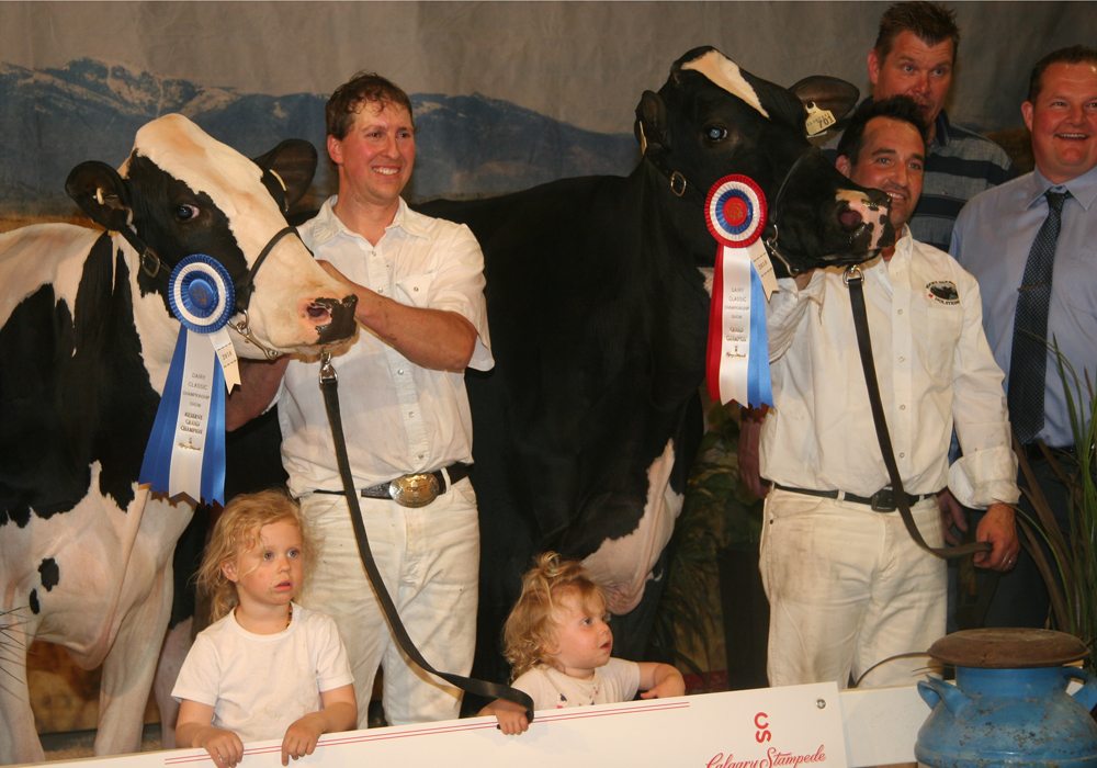 Joel Phoenix with the Wendon champion and on the left is Markus Mosnang with his two daughters, Adair and Georgia. | Barbara Duckworth photo