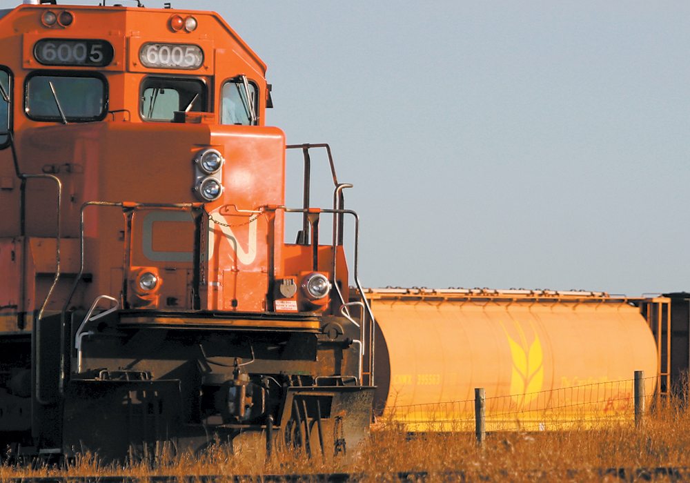 Canadian National Railway is considering the purchase of 1,000 new grain hopper cars, but it is “contingent on the passage of Bill C-49 without amendments,” J.J. Ruest, the company’s interim president and chief executive officer, said during an April 24 conference call with investors. | File photo