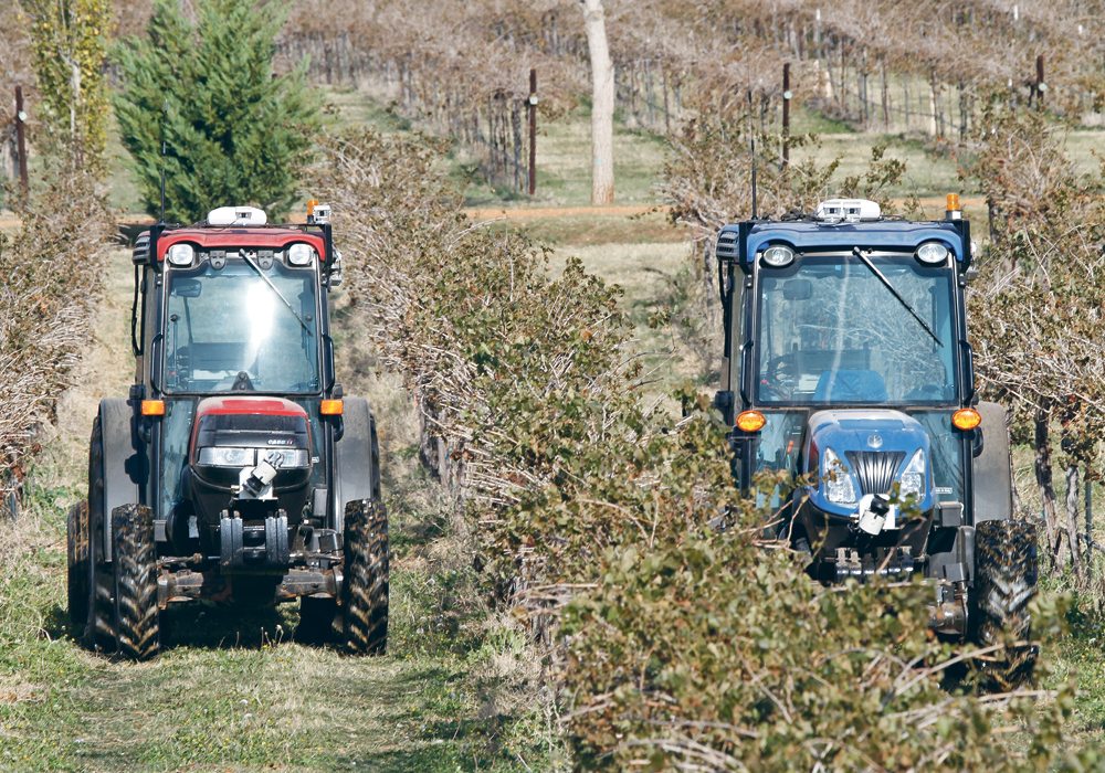 ASI of Utah is working with Case IH and New Holland on vineyard and large-scale field equipment and operations, using a system that allows a single operator to simultaneously manage multiple vehicles. Advanced path-generating algorithms calculate the most efficient area coverage pattern for a field taking into account the type of task, size of implements, number of vehicles in the field, and vehicle and implement turn radius. Each unmanned farm vehicle is equipped with a series of hardware and software components that permit a user to toggle between manual and robotic control. The components work with the existing by-wire, mechanical or hydraulic control system and link vehicles to a central command station. |  ASI photo