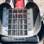 Hard, lumpy fertilizer gets ground into pea-sized pellets by the LumpBuster. It keeps up with the auger, regardless of speed and lump size. | WestCap Ag photo