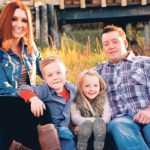 Jen and Brooks White, along with their children, Sawyer, left, 7, and Piper, 4, run a mixed farm with 600 head of bison and 5,000 acres of annual crops. | Submitted photo