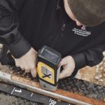 David Weindorf takes PXRF scans of a soil core pulled from a cotton field. Information provided by the scan gives a measure of 20 soil elements in just one minute. | Soil Science Society of America photo