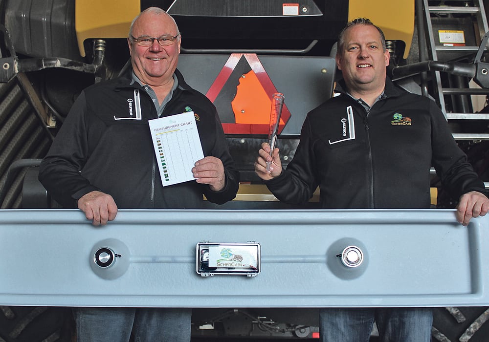 Pat Scherman and son Trevor got the idea for their ScherGain Solution System while arguing about combine settings out in the field.  They finally agreed they were wasting their energy arguing when they should instead concentrate their efforts on devising a system for safely collecting grain loss data.  |  Ron Lyseng photo