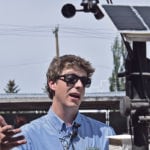 Adam Stanford explains a do-it-yourself version of a soil sensor that would likely be affordable for most producers. He presented an example at a June 7 ‘Plot Hop’ event organized by the Farming Smarter applied research group. | Barb Glen photo
