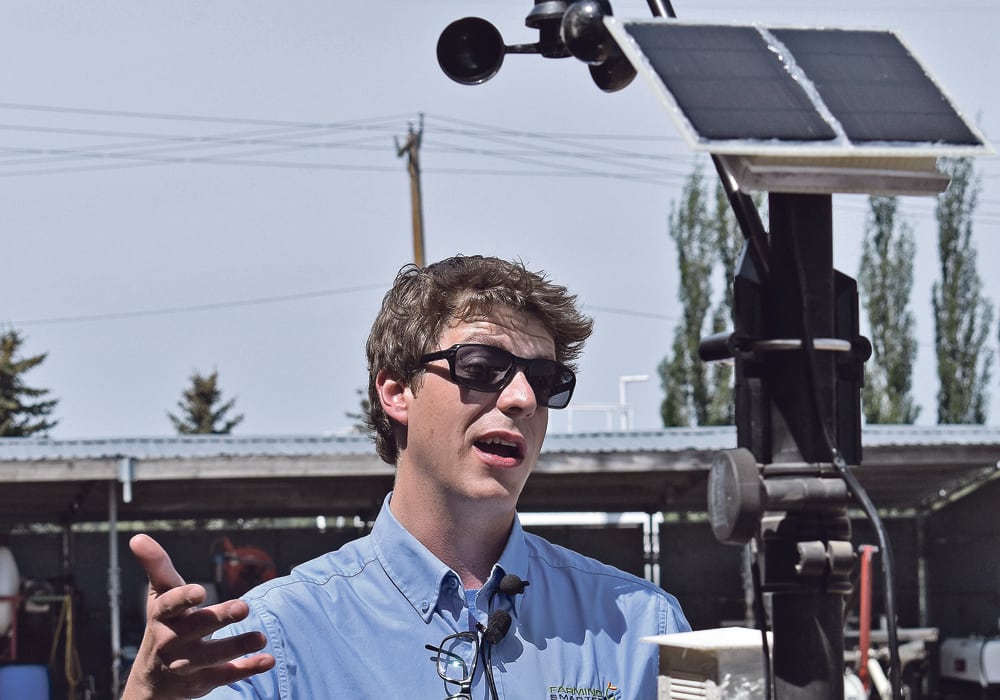 Adam Stanford explains a do-it-yourself version of a soil sensor that would likely be affordable for most producers. He presented an example at a June 7 &lsquo;Plot Hop&rsquo; event organized by the Farming Smarter applied research group.  |  Barb Glen photo
