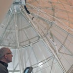Mark Abt, senior radar technologist with Environment Canada, controls a parabolic radar antenna, which is 9.15 metres in diameter. It rotates once every 10 seconds and scans 17 elevations in six minutes. This larger dish provides more accurate and higher quality weather information compared to older techology of the previous Radisson, Sask., weather radar. | William DeKay photo