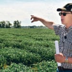Rob Graf, winter wheat breeder with Agriculture Canada, discusses his research work June 7 during a plot hop organized by the Farming Smarter applied research group. | Barb Glen photo